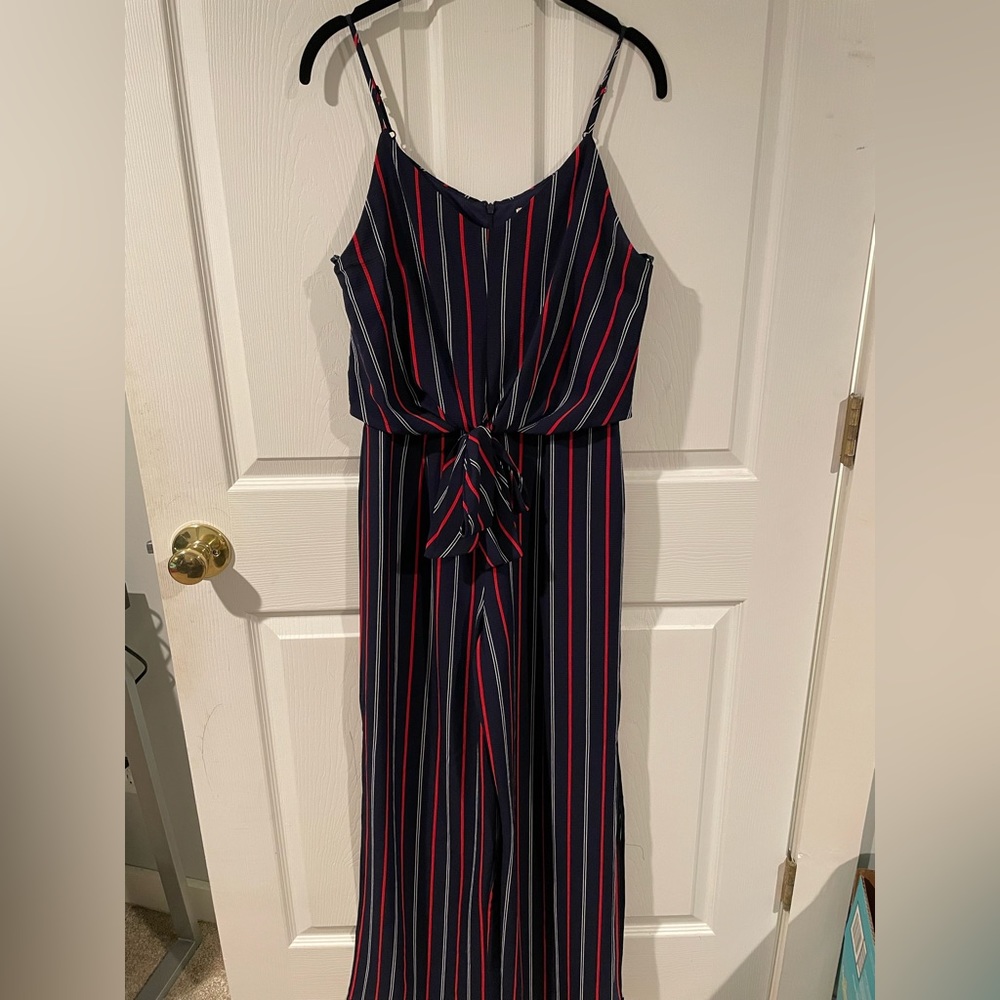 Navy and red striped jumpsuit, with tie and split leg. Size medium